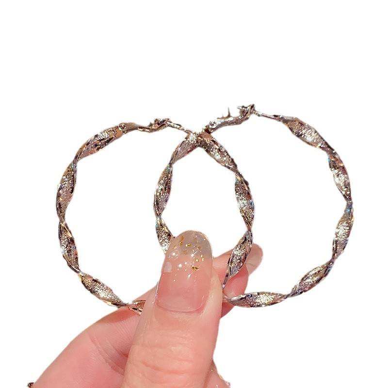 Elegant Twisted Hoop Earrings – Silver Shine